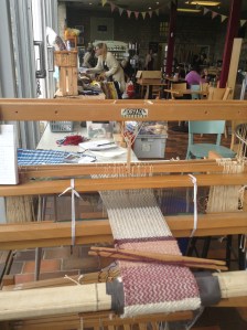 Demonstration of weaving on my folding floor loom. 