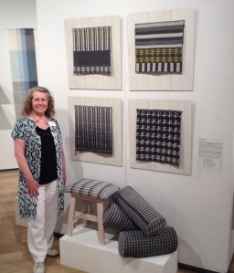 Designer Crafts on the Mall Private View evening - my display of handwoven wool rug samples, upholstery and bolster cushions.